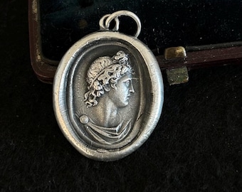 The God Apollo, Impression of Grand tour intaglio.  Solid sterling silver pendant of the head of the beautiful God.