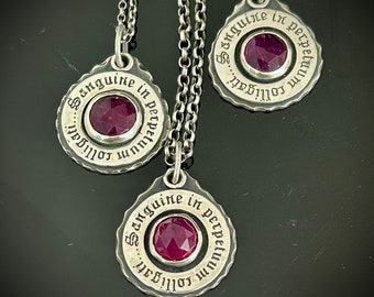 Bound by Blood forever.... sterling silver and ruby handmade pendant.