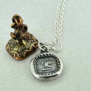 Pelican in her piety, parenthood necklace.  Family pendant, mother nurturing her young. Silver Mother or father gift,  chicks in a nest.