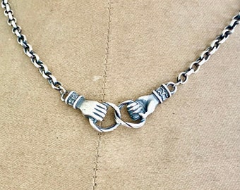 Clasped hands necklace.  Sterling silver, joined hands, 3mm sterling rolo chain in the length of your choosing