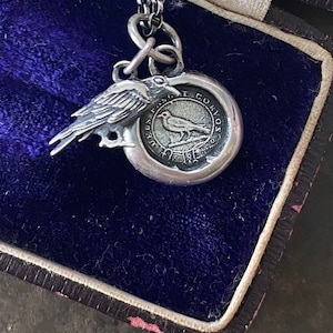 Tiny raven and God Feeds the Ravens combo…. sterling silver antique wax letter seal and 3D double sided raven charm. Religious pendant.