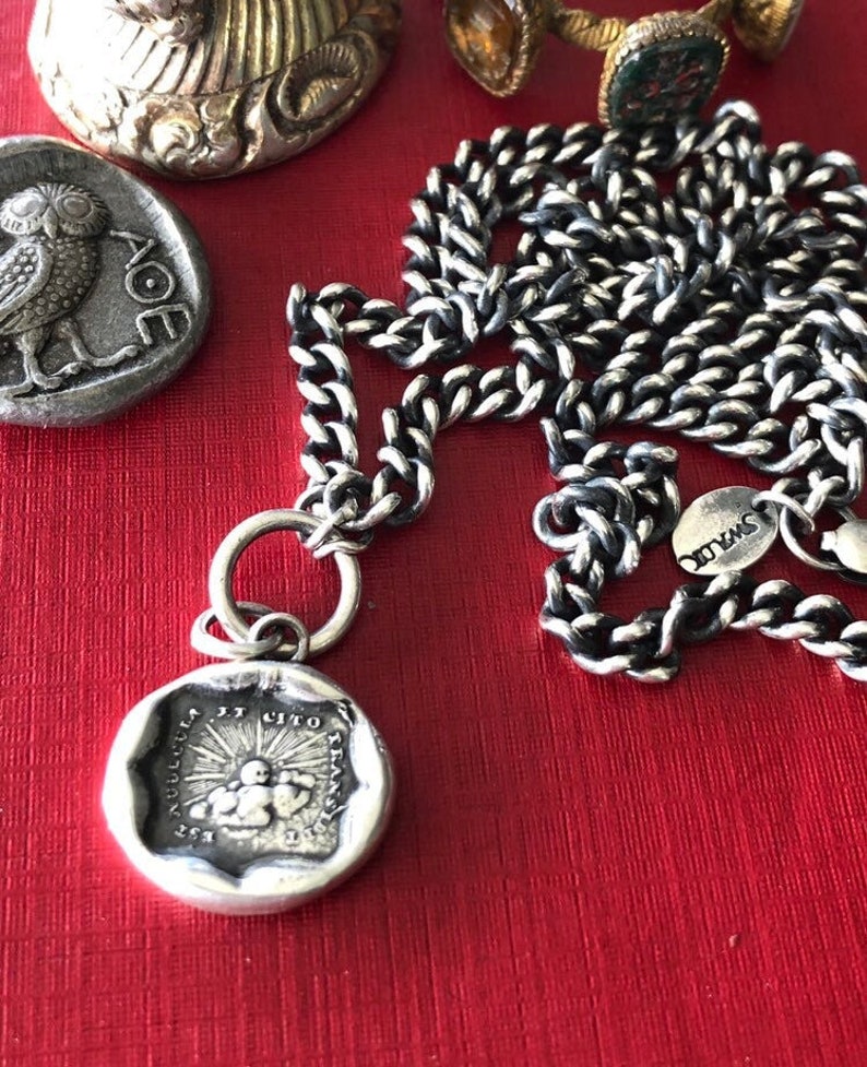 Storms pass and hard times don't last forever..... handmade, sterling, antique wax seal necklace.