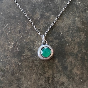 Green Onyx and sterling silver Add ON. add some colour to your meaningful necklace. 6mm green onyx set  in a nugget of sterling silver.