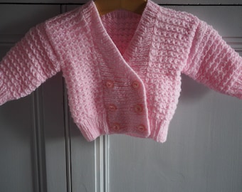 Hand knitted baby girl's pink double breasted cardigan, knitted baby jacket, baby coat, baby shower gift, new baby gift.