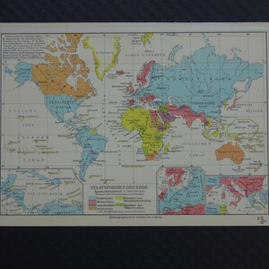 May include: A vintage world map with countries colored in shades of blue, yellow, orange, and pink. The map includes text in German, with the title "STAATSFORMEN DER ERDE" and a legend. The map is printed on aged paper.