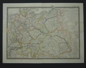 Könnte beinhalten: Antike Karte von Mitteleuropa mit detaillierten geografischen Informationen. Die Karte ist auf gealtertem Papier gedruckt und weist komplizierte Linien und Text auf. Der Titel "L'EUROPE CENTRALE" ist sichtbar, zusammen mit anderem Text auf Französisch. Die Karte ist mit einem dekorativen Rahmen versehen.