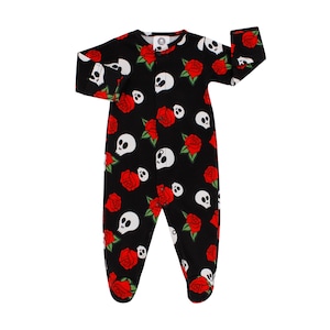 May include: Black and red baby sleeper with a skull and rose print.