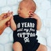 Katy Apicello reviewed 18 years tattoo baby vest