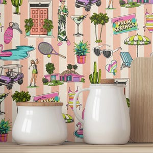 May include: A whimsical wallpaper design featuring a repeating pattern of Palm Springs-themed illustrations. The pattern includes golf carts, swimming pools, tennis rackets, and retro swimwear, all set against a backdrop of pink and white stripes. The words "Palm Springs" are visible.