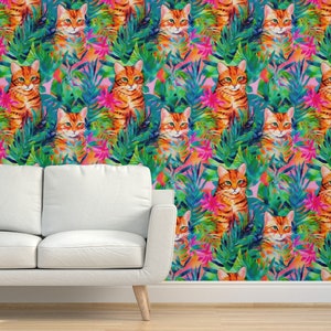 May include: A seamless pattern featuring orange tabby cats with green, blue, and pink tropical foliage. The cats are looking directly at the viewer.