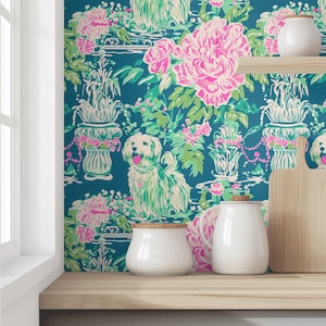 May include: Teal blue wallpaper with a floral pattern featuring pink flowers, green leaves, and a white dog. The wallpaper is shown in a kitchen setting with white ceramic canisters and a wooden cutting board.