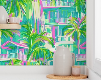 May include: A colorful wallpaper with a tropical theme featuring palm trees and buildings with balconies. The wallpaper is in shades of green, blue, pink, and white.