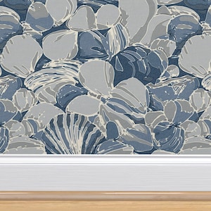 a picture frame with a picture of a bunch of seashells