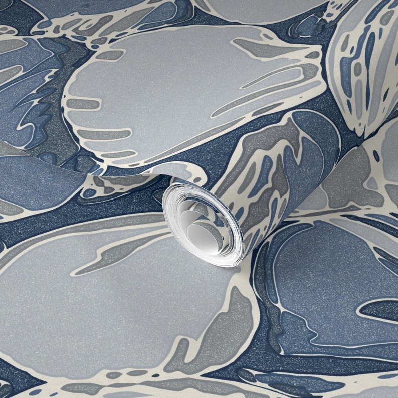 a close up of a blue and white wallpaper