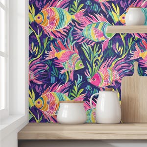 May include: A vibrant wallpaper design featuring colorful fish in shades of pink, yellow, green, and blue against a dark blue background. The fish are surrounded by stylized seaweed and coral, creating an underwater scene.