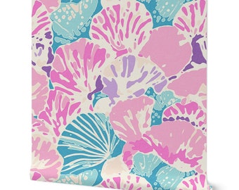 May include: A seamless pattern featuring pink, blue, and purple stylized seashells on a cream background.