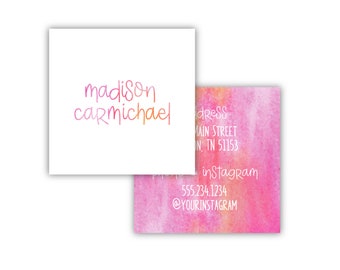May include: Two square business cards. The top card is white with the name madison carmichael in a gradient orange and pink script. The bottom card features a pink and orange watercolor background with white text including an address and phone number.
