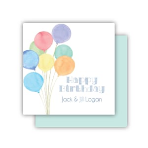 以下が含まれることがあります： カラフルな風船の水彩画と「Happy Birthday Jack & Jill Logan」というテキストが書かれた白いカードです。