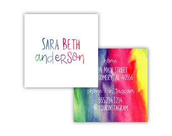 May include: A colorful watercolor business card with the name "SARA BETH anderson" in rainbow lettering. The card also includes contact information, including a home address, phone number, and Instagram handle.