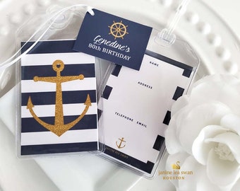 May include: Clear plastic luggage tags with nautical-themed inserts. One tag features a gold glitter anchor over navy and white stripes. Another has a navy background with a gold ship's wheel and the text "Genedine's 80th BIRTHDAY".