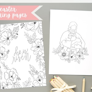 May include: Two black and white printable Easter colouring pages. One page features a floral design with the text "He is risen". The other page features a drawing of Jesus holding a lamb with floral accents.