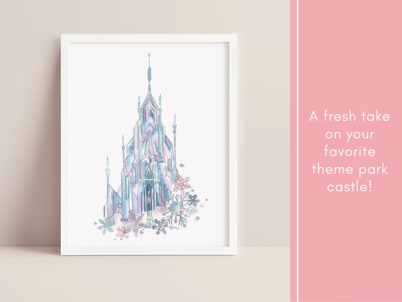 May include: Watercolor print of a castle in shades of blue, purple, and pink, framed in white. The castle is adorned with snowflake accents. Text on the right reads, "A fresh take on your favorite theme park castle!"