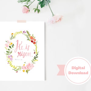 May include: A watercolor illustration of a floral wreath with the text "He is risen. Matthew 28:6" in pink lettering.