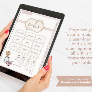 May include: A digital tablet displaying a pink and white recipe index template with categories for breakfast, starters, bread, soup, main, salads, sauces, desserts, beverages, notes, and recipe templates. The tablet is being held by a person's hands. The text "index" is visible in the top center of the screen. The text "Organize your favorite recipes in a user-friendly and visually stunning manner, all within the convenience of your tablet!" is visible on the right side of the image. The text "Compatible with Goodnotes & Notability" is visible in the bottom right corner of the image.