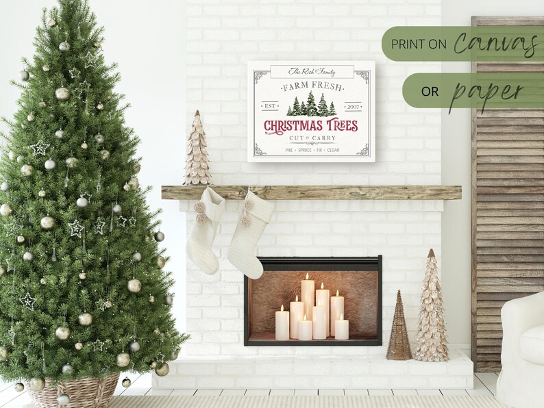 May include: A white sign with a red and green Christmas tree design. The sign reads "The Red Family Farm Fresh Christmas Trees Cut Carry Pine Spruce Fir Cedar". The sign is displayed on a white brick fireplace mantel with a lit fireplace below.