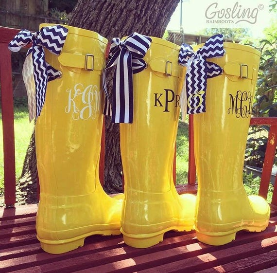 yellow rain boots with bow