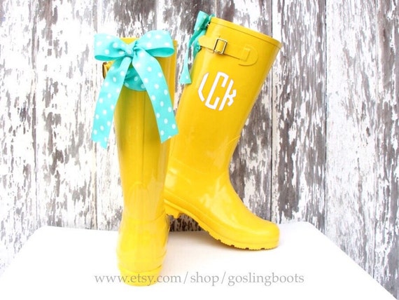 yellow rain boots with bow