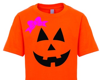 Pumpkin face with bow