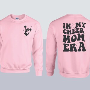 In my Cheer Mom Era sweatshirt