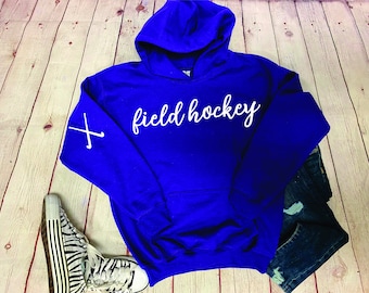 Field Hockey with crossed sticks on sleeve