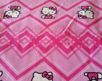 Tela/material de algodón con estampado de Hello Kitty para coser/acolchar.