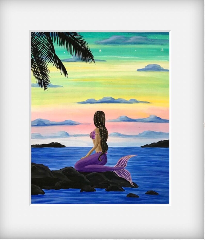 May include: A painting of a mermaid sitting on a rock in the ocean. The mermaid has long black hair and is wearing a purple tail. The sky is a vibrant sunset with pink, orange, and yellow clouds.