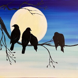 Japanese crows on a branch