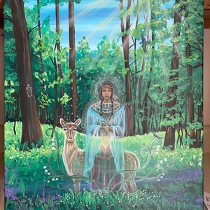 May include: A painting of a woman in a forest setting. She is wearing a blue and white dress and a headdress. She is holding a small white object in her hands. A deer stands beside her. The background is a lush green forest with sunlight streaming through the trees.