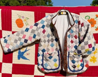 100-year-old Quilt Jacket: blue, white, brown patchwork
