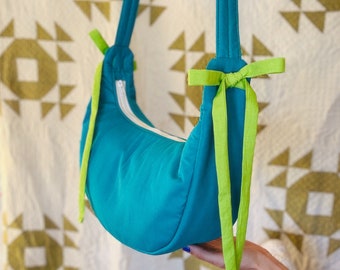 Crescent Crossbody Bow Bag: Teal + Lime