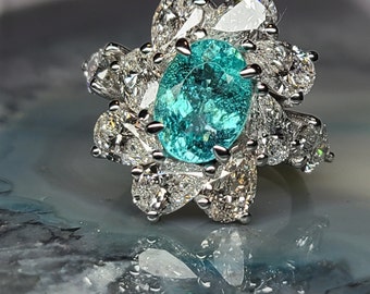 GIA certified Paraiba Tourmaline and lab grown diamonds statement ring.