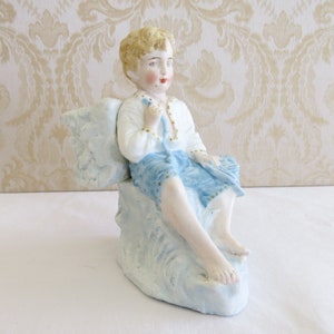 Antique French Bisque Porcelain Figurine in Soft Colors: White, Pastel Blues, with Hand-painted Details, Facial Features Barefoot Boy