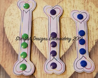 Heart shaped cord keeper