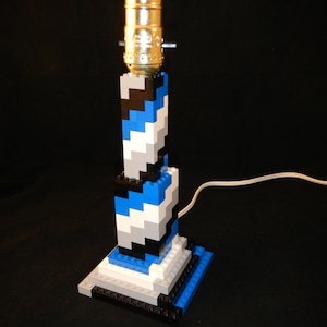 Blue, black, white and gray Spiral stick lamp made of LEGO® elements