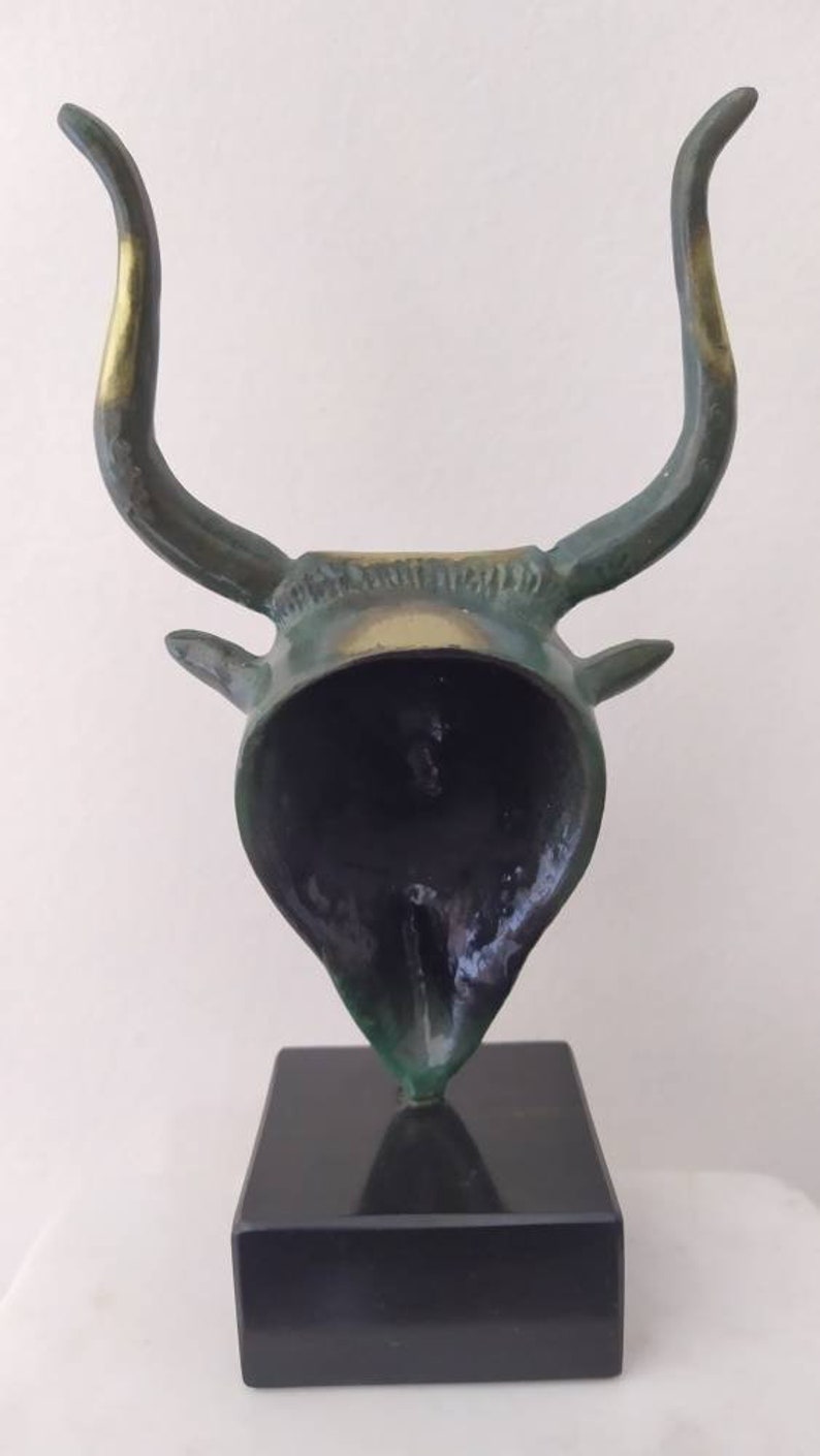 Head bull on marble base