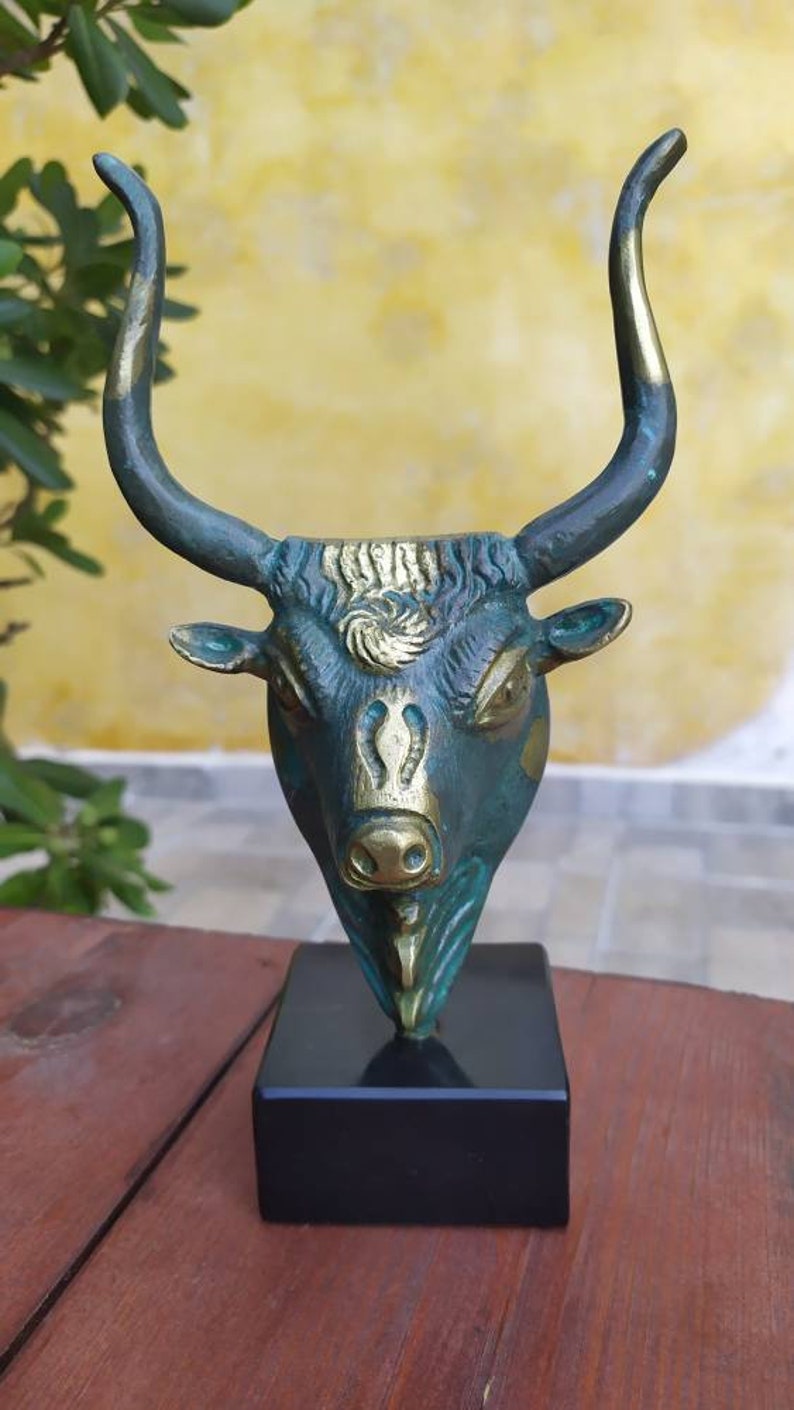 Head bull on marble base