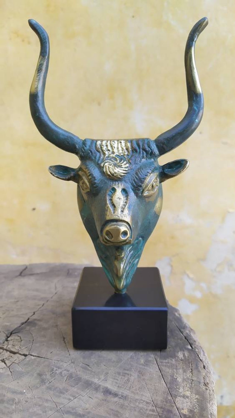 Head bull on marble base