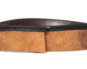 May include: Close-up of a brown leather belt with a black stitched border. The belt has a light brown suede texture on the front and a darker brown smooth leather on the back. The belt is designed for everyday wear.