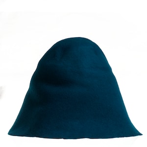 May include: A teal blue felt hat with a rounded crown and a wide brim.