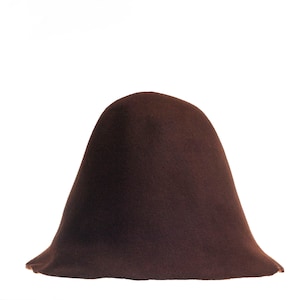 May include: A brown felt hat with a wide brim and a tall, conical crown.